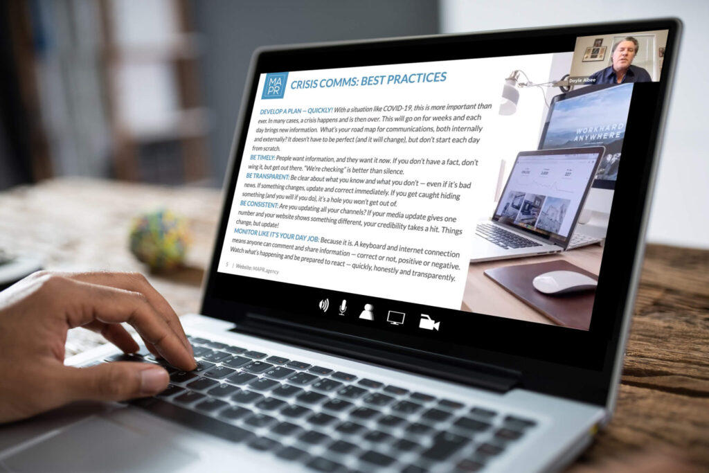 Comprise Webinar displayed on a laptop